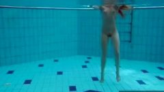 Milana And Katrin Strip Eachother Underwater